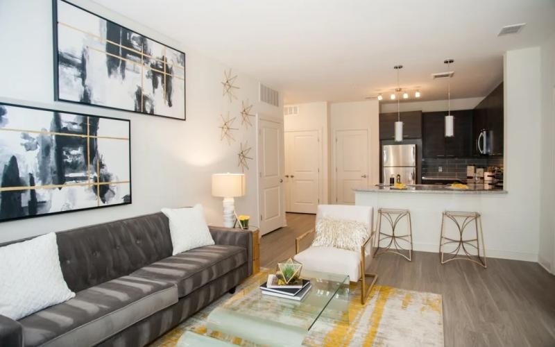 a living room with a couch and a table